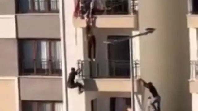 Video thumbnail for Girl rescued by free-climbing neighbour from balcony in Turkiye