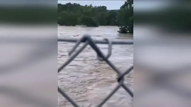 Video thumbnail for US: Dramatic Moment Missouri Rescue Boat Capsizes In Swift Floodwaters.