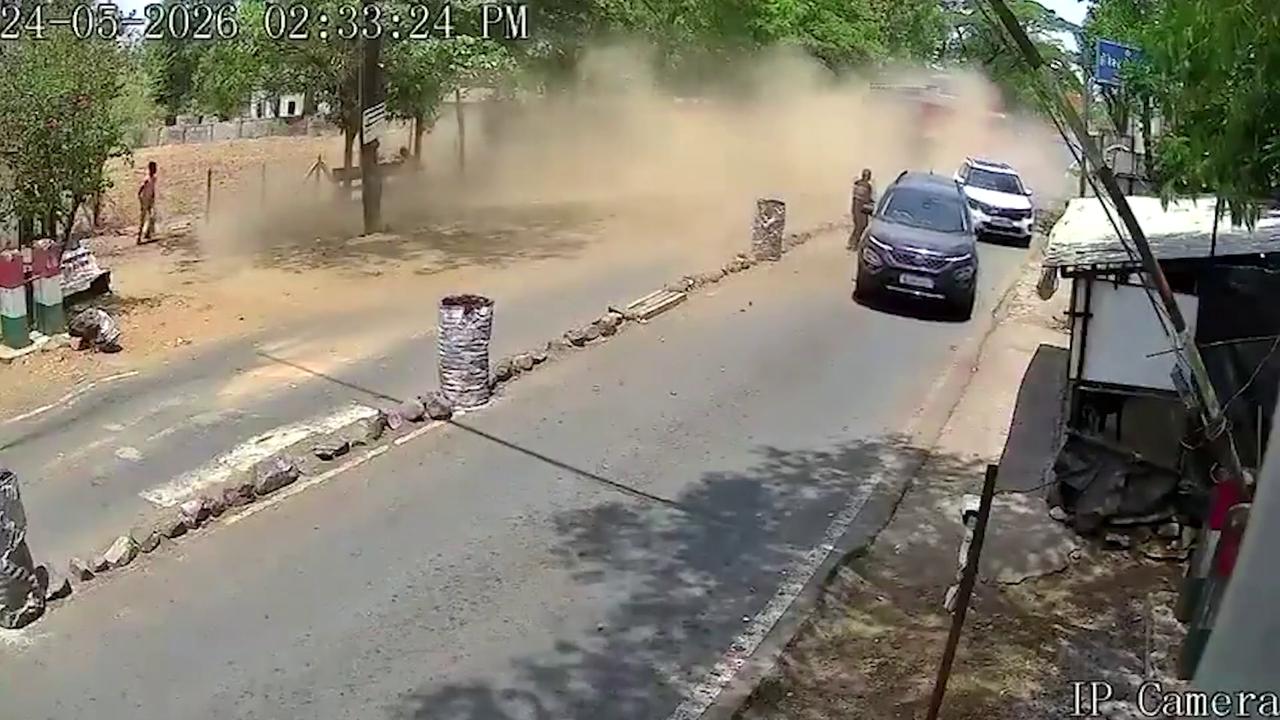 Video thumbnail for India: Truck slams into tractor-trailer near toll plaza as sudden slowdown occurs over speed breaker.