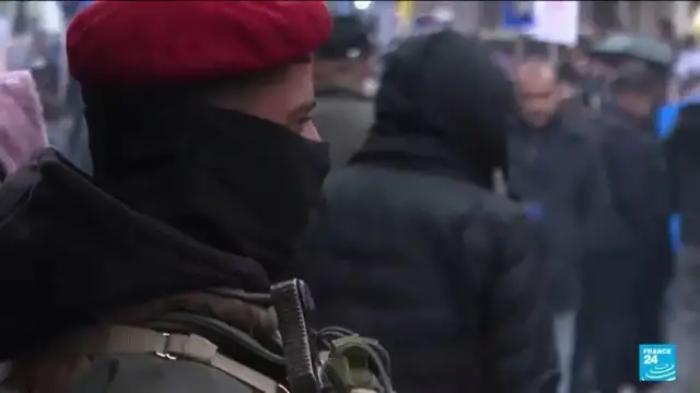 Video thumbnail for Syrian army enters northern towns after Kurdish fighters withdraw