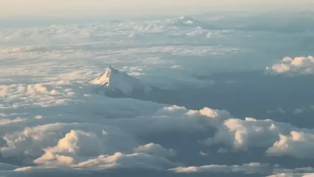 Video thumbnail for Sunset Aerial View of Snowy Mount Hood from Portland Flight
