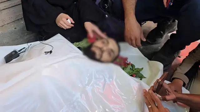 Video thumbnail for Relatives bid farewell to journalist killed in Israeli attack on Gaza.