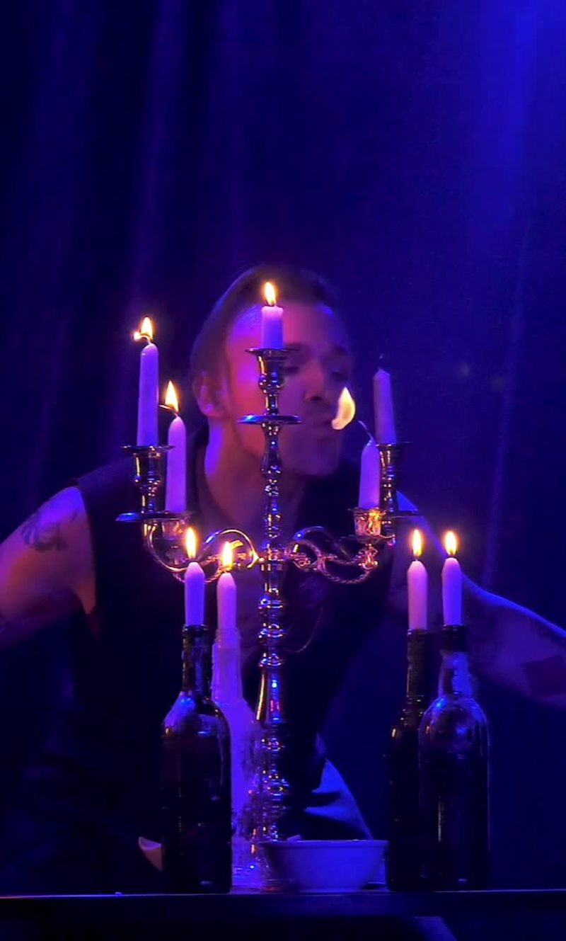 Video thumbnail for Fire Artist Manipulating Candle Flames on Stage