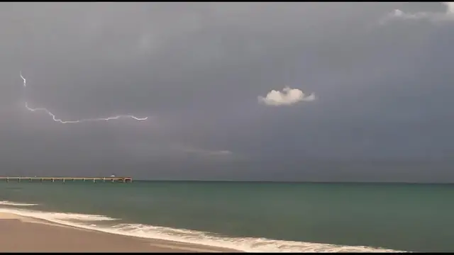 Video thumbnail for US: Lightning strikes over the ocean.