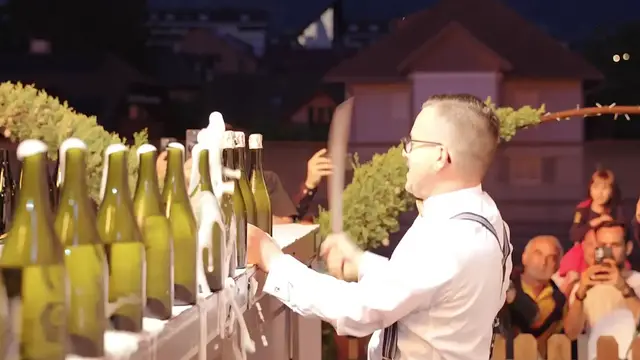 Video thumbnail for Most champagne/sparkling wine bottles sabered in one minute - 91 by Mirko Rainer