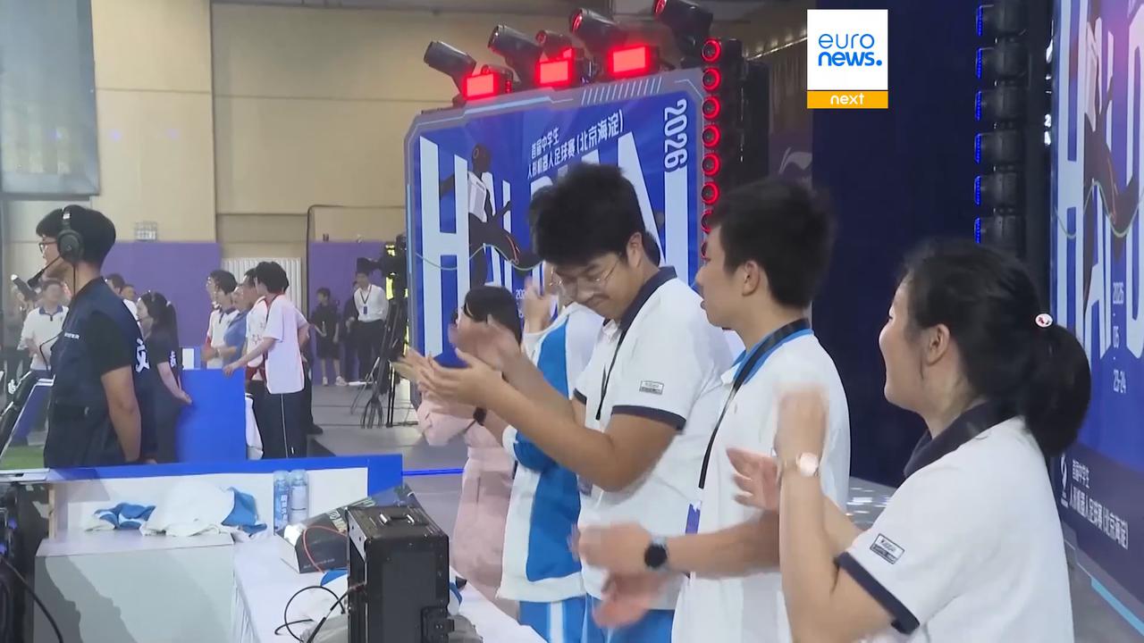 Video thumbnail for Humanoid robots face off in Beijing’s first-ever high school football tournament