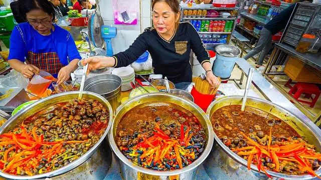 Video thumbnail for VIETNAM STREET FOOD Seafood Paradise  Bánh Xèo + CRAZY Snail Feast in Da Nang!