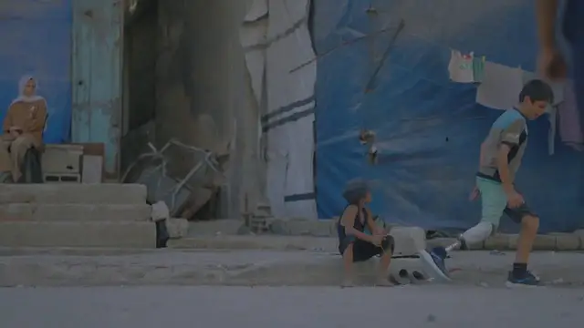 Video thumbnail for Gaza Boy Plays With Prosthesis.
