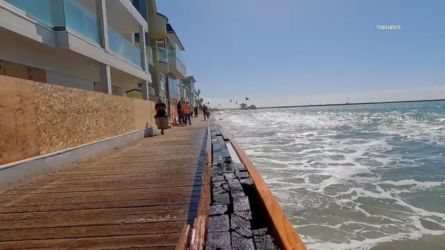 Video thumbnail for US, Los Angeles: Long Beach Waves Pound Boardwalk Near Homes Part 1.