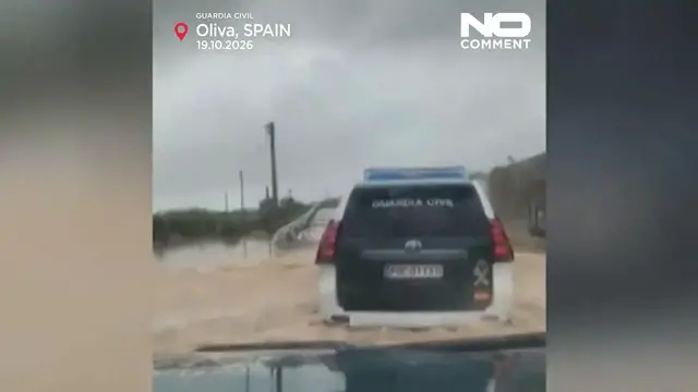 Video thumbnail for Spain: Guardia Civil rescues family and dogs from rising floodwaters in Oliva