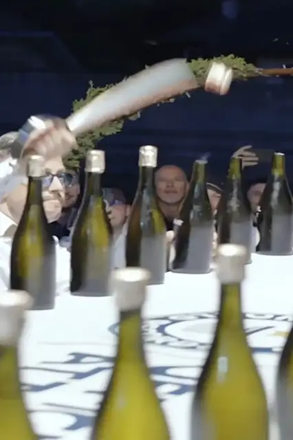 Video thumbnail for Most champagne wine bottles sabered in one minute - 91 by Mirko Rainer