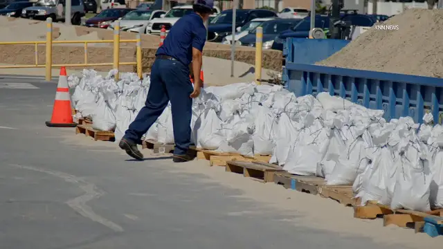Video thumbnail for US, Los Angeles: Long Beach Waves Pound Boardwalk Fire Department Sets Up Sand Bag Distribution Part 2.
