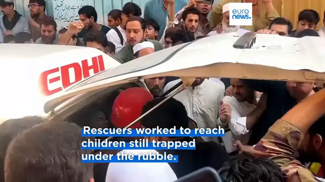 Video thumbnail for School roof collapse kills teacher and at least 28 children in northwest Pakistan