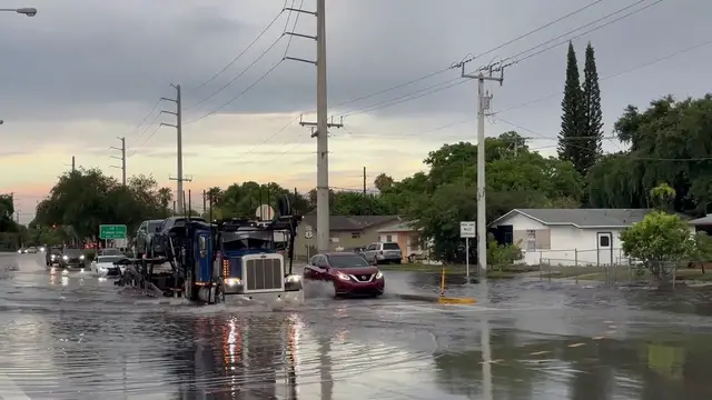 Video thumbnail for US: Vehicles Drive Through Major Street Flooding in Hollywood.