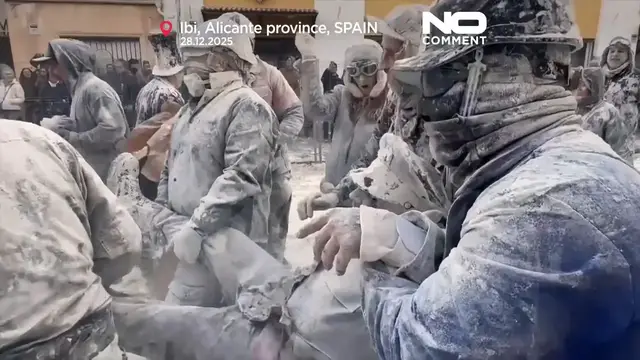 Video thumbnail for Els Enfarinats: Revelers battle with flour and eggs in traditional Spanish festival