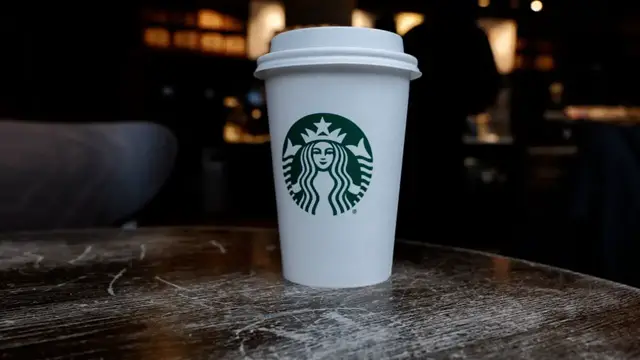 'Video thumbnail for New Starbucks dress code requires black tops and neutral pants'