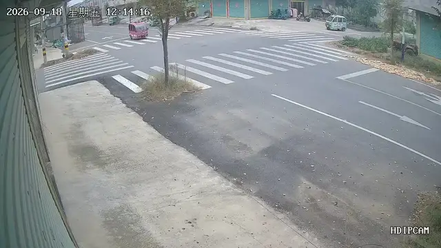 Video thumbnail for Cargo Tricycle Overturns to Avoid Speeding Car at Jiangsu Intersection
