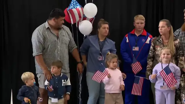Video thumbnail for Dozens of white South Africans welcomed to US as refugees