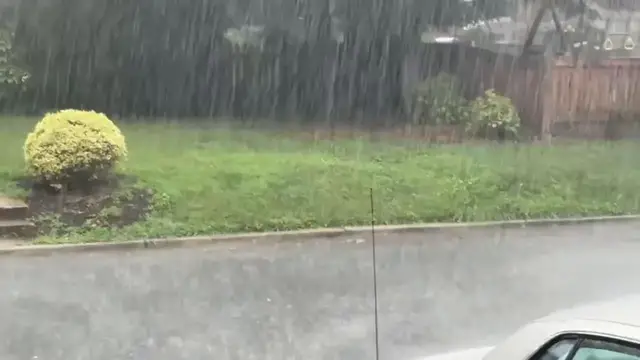 Video thumbnail for US: Heavy Downpour Drenches Silver Spring as Intense Rain Sweeps Through Maryland Neighborhood.