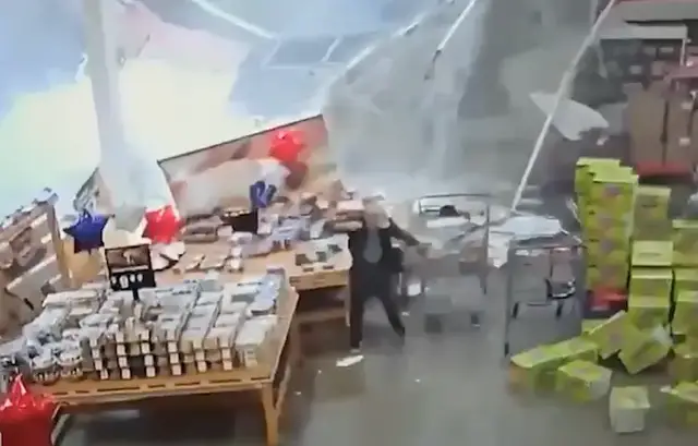Video thumbnail for Surveillance video captures moment BJ's roof collapses with customers nearby