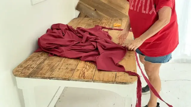 Video thumbnail for She rips up a red bedsheet for this BRILLIANT porch idea!