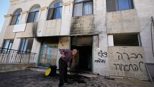 Video thumbnail for Israeli settlers torch mosque in West Bank village of Jiljilya