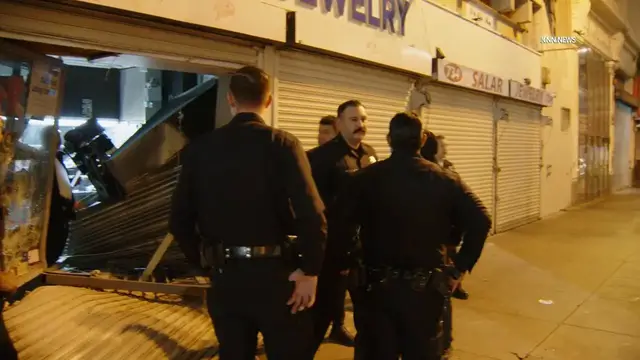Video thumbnail for US, Los Angeles: Downtown Los Angeles Los Angeles Suspects Crash Van Into Jewlery Store Part 2.