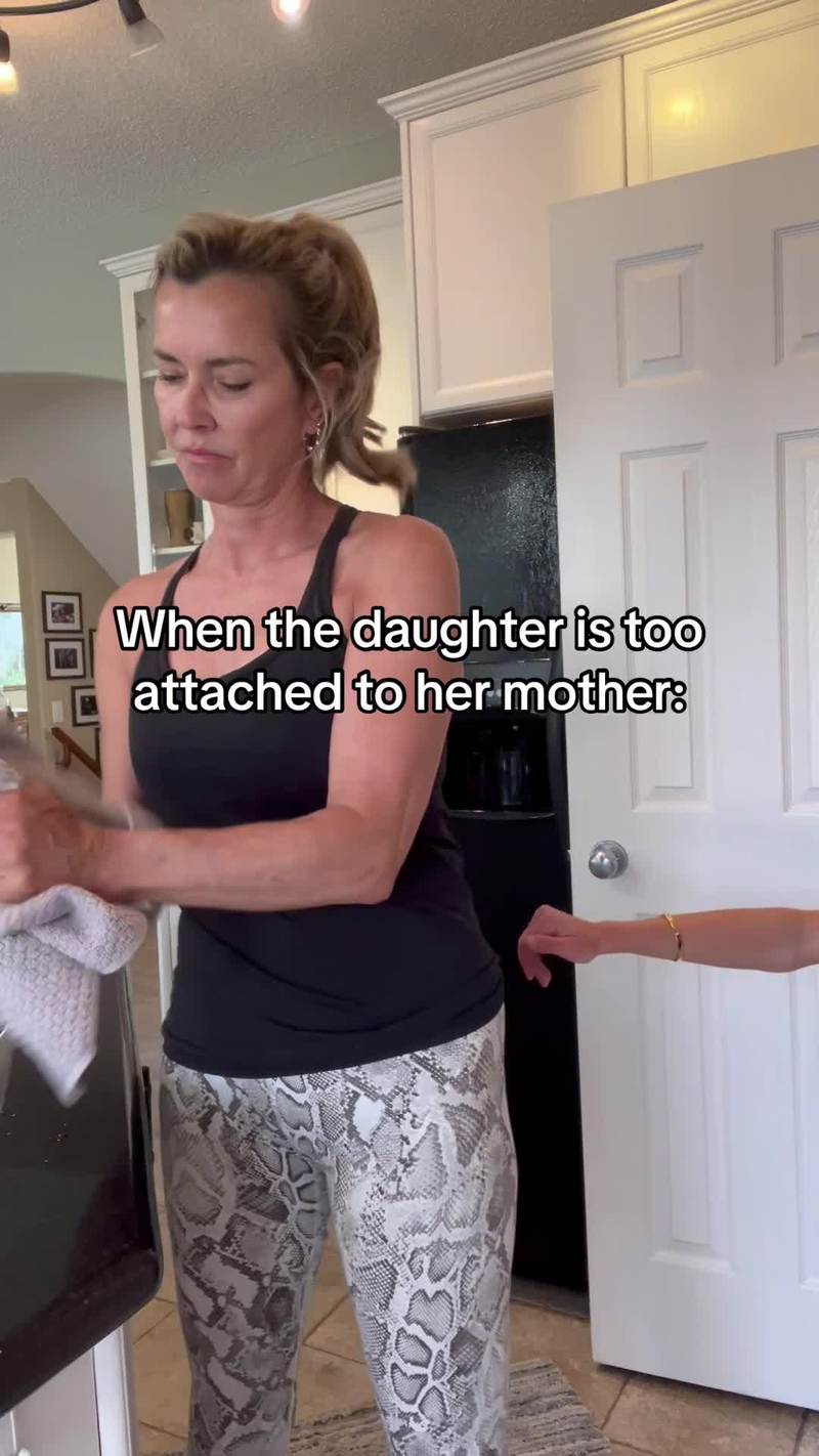 Video thumbnail for Clingy Grown Daughter Gets a Ride from Mom in the Kitchen
