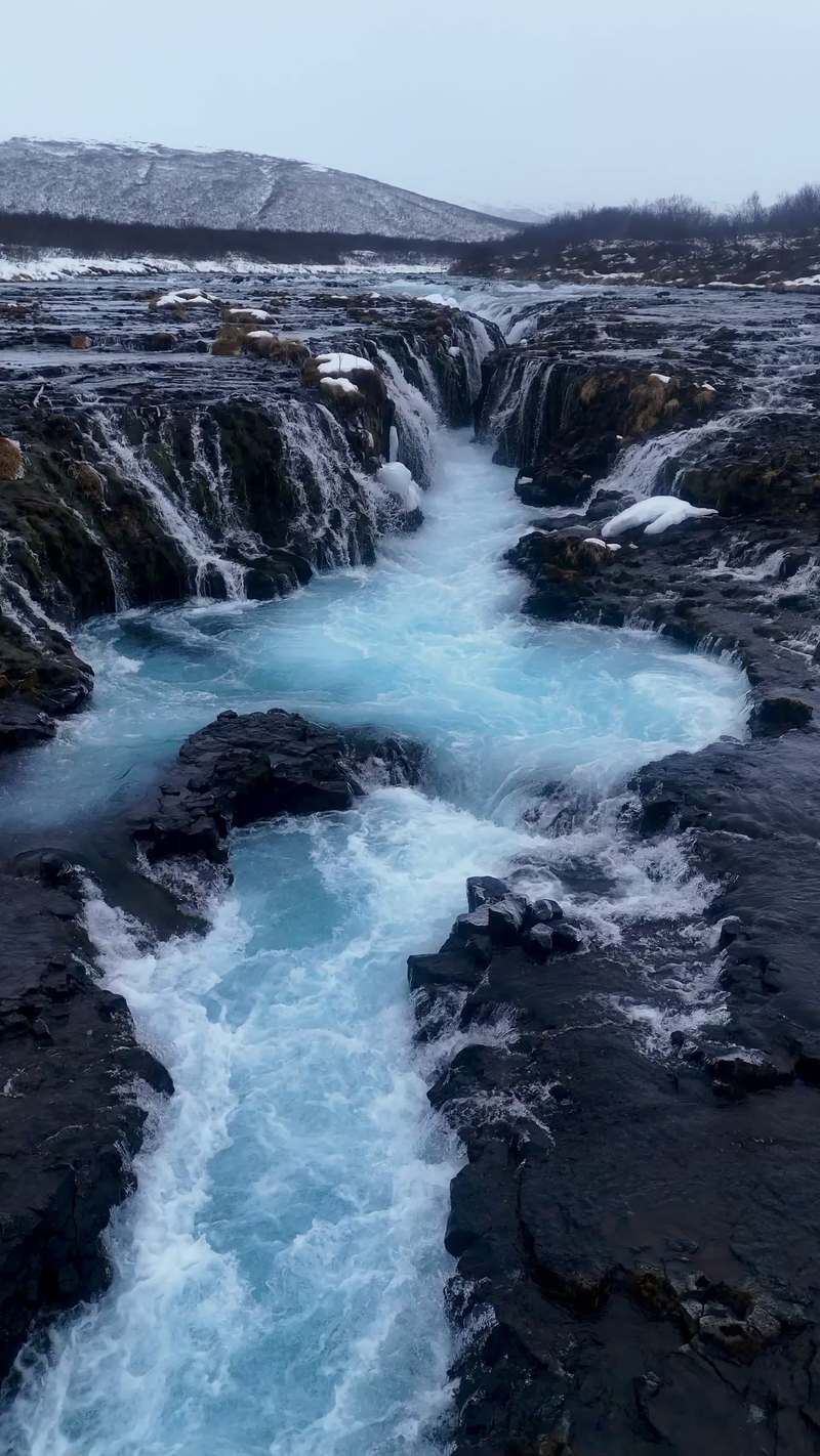 Video thumbnail for Icy Blue Waters of Bruarfoss Waterfall in Iceland