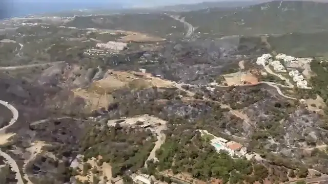Video thumbnail for Spain: Aerial firefighting continues as wildfire kills 12 in southern Spain (2).