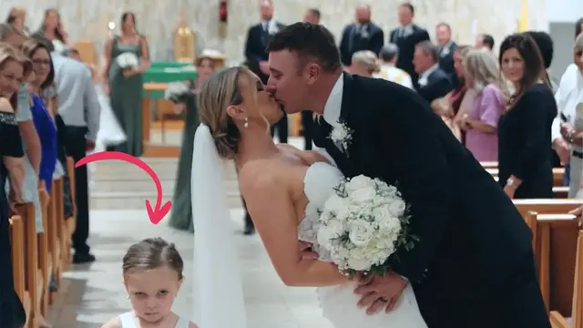 Video thumbnail for Daughter Not Happy With Mom And Dad's Wedding Kiss