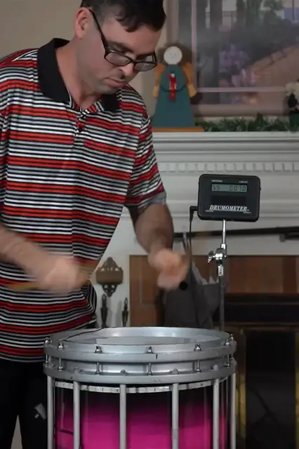 'Video thumbnail for Lifelong drummer sets records for stick flipping and hitting'