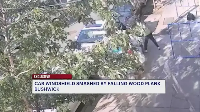 Video thumbnail for Car windshield smashed by falling wooden plank in Bushwick