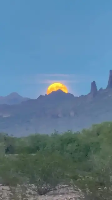 Video thumbnail for Golden Harvest Moon Rising over the Superstition Mountains