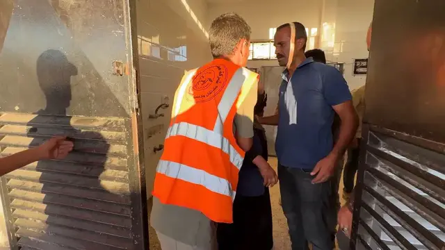 Video thumbnail for Palestinian mother retrieves son’s remains days after Israeli attack.
