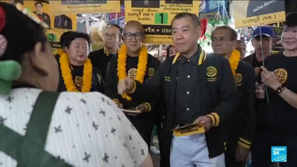 Video thumbnail for Thailand votes in three-way race under military scrutiny