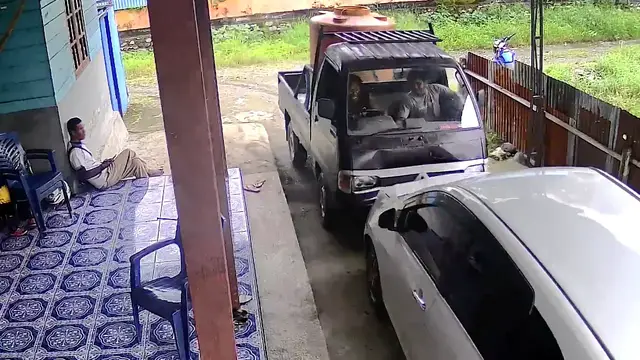 Video thumbnail for Pickup Truck Bumps Parked Car in Papua Compound