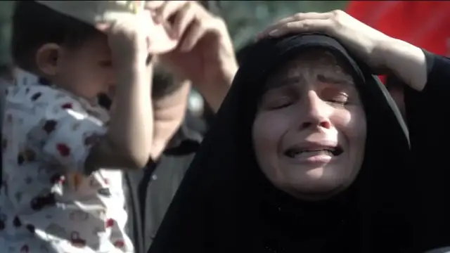 Video thumbnail for In Tehran, funeral attendees grieve the loss of supreme leader Ali Khamenei
