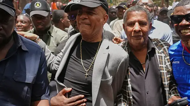 Video thumbnail for Former Haitian president expected to testify in court on rare visit home