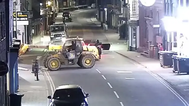 Video thumbnail for UK: CCTV captures suspects using heavy machinery to steal ATM in Cambridgeshire.