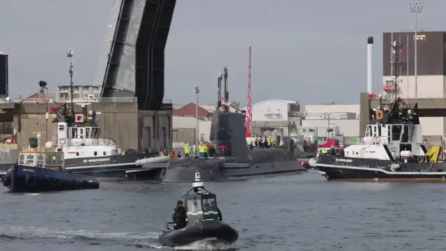 Video thumbnail for UK: Britain’s New Nuclear Submarine Sails For Sea Trials.