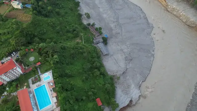 Video thumbnail for Nepal: Aerial footage shows trail of destruction left by Nepal's flash floods in Bidur.