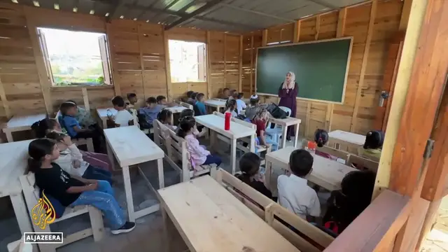 Video thumbnail for Students return to schools in Gaza: Aid pallets turned into makeshift classrooms