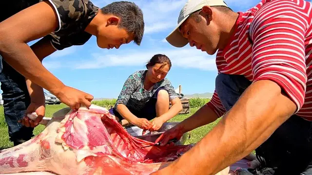 'Video thumbnail for Mongolian Food - EXTREME BBQ SHEEP HEAD in Mongolia | RARE Nomadic Food in Mongolia!'