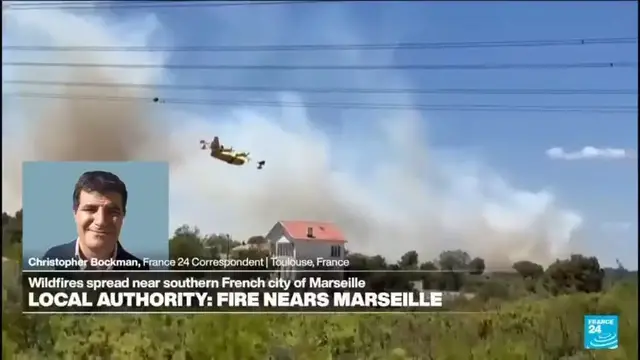 Video thumbnail for Wildfire threatens Marseille, shuts down airport