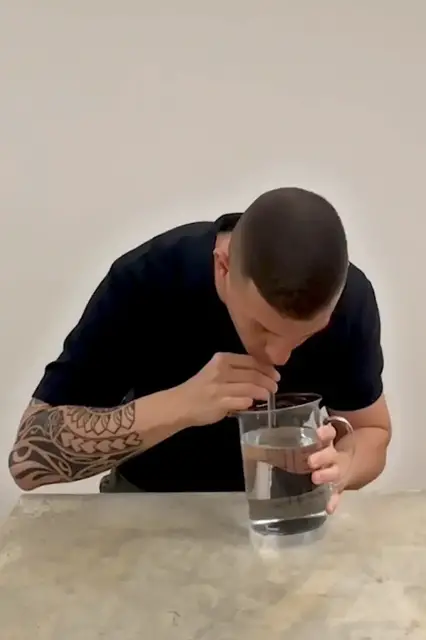Video thumbnail for Fastest time to drink one litre of water through a straw - 12.97 seconds by Andre Ortolf