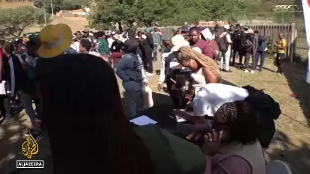 Video thumbnail for South Africa anti-migrant tension: Locals pressure businesses for foreigners' jobs