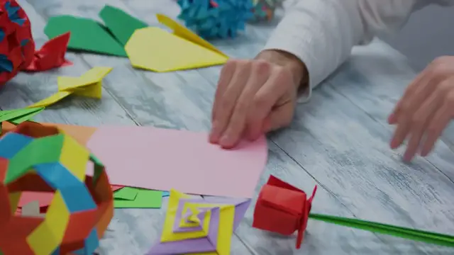 Video thumbnail for Master the Art: Crafting an Easy-to-Fold Origami Rose