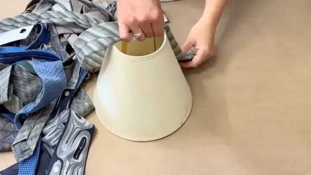 'Video thumbnail for Tie a neck tie around a lamp shade for this BRILLIANT dining room idea!'