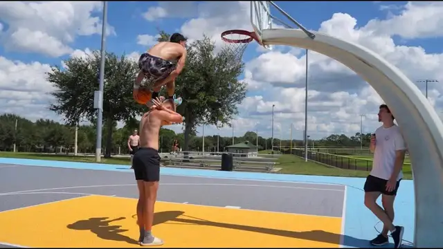 'Video thumbnail for Isaiah Rivera: insane 50.5 inch vertical dunk on outdoor court!'